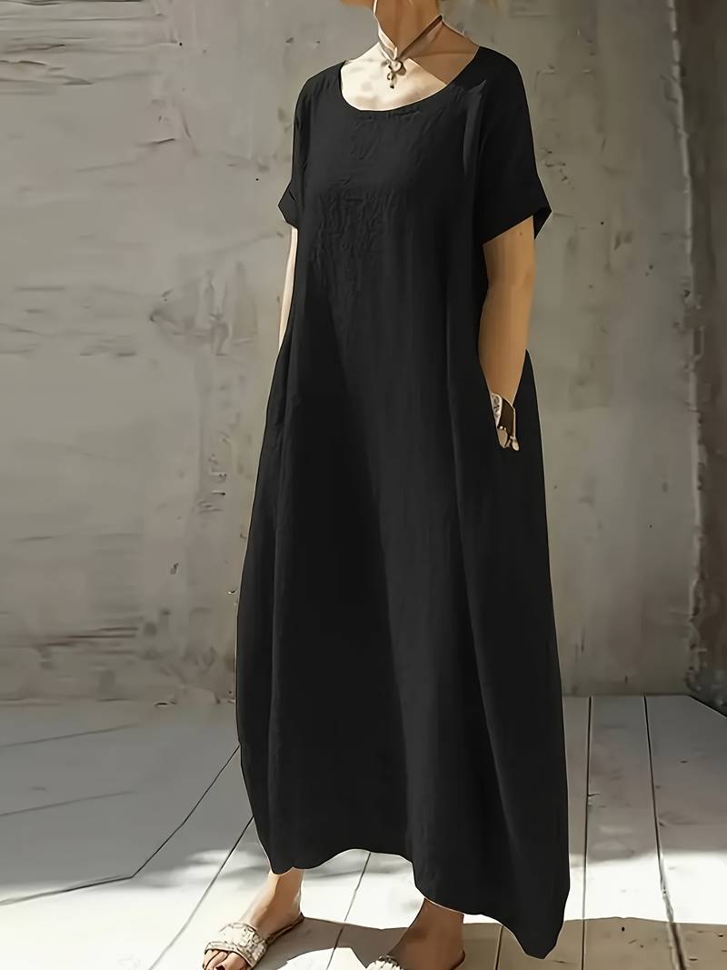 Detalle de las mangas amplias y cómodas del vestido largo Lola para mujer, estilo relajado de verano.
