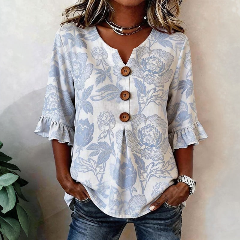 Blusa floral vintage azul para mujer con estampado elegante, manga 3/4 y escote V, ideal para moda casual.