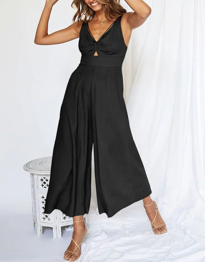 Mono elegante de mujer sin mangas, escote V y pierna ancha. Ideal para fiesta o evento.