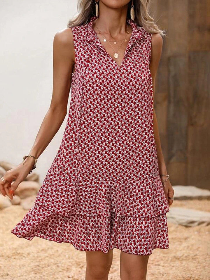 Vestido midi elegante estampado floral, perfecto para bodas y fiestas de primavera.