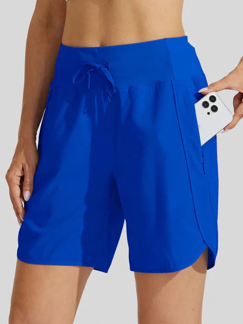 Short deportivo algodón mujer, cintura alta, bolsillos laterales. Comodidad garantizada en fitness.