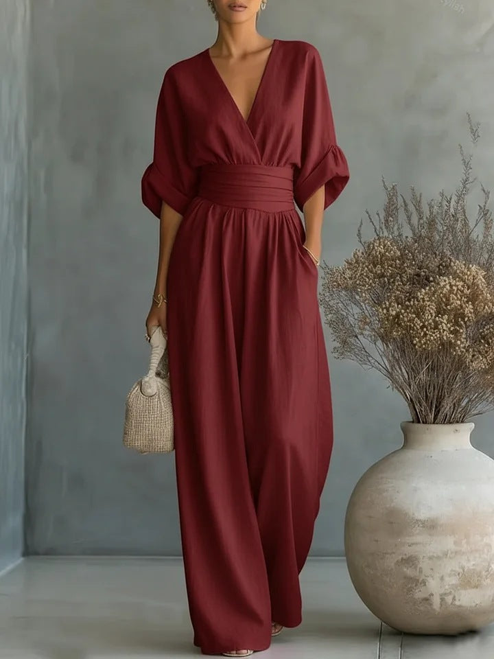 Mono de vestir para mujer, con pantalón palazzo y favorecedor escote en V, ideal para eventos.