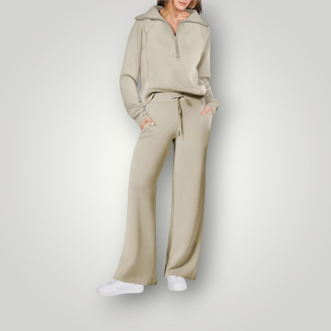 Elegante conjunto loungewear de mujer en color neutro con suéter y jogger, ropa de casa versátil.