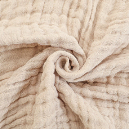 Suave manta de algodón orgánico, hipoalergénica, perfecta para decoración y confort en el hogar.