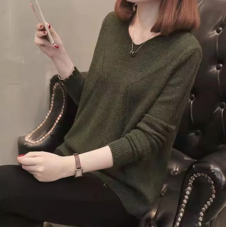 Chaleco largo de punto para mujer, diseño sin mangas, versátil, perfecto para looks casuales y modernos.