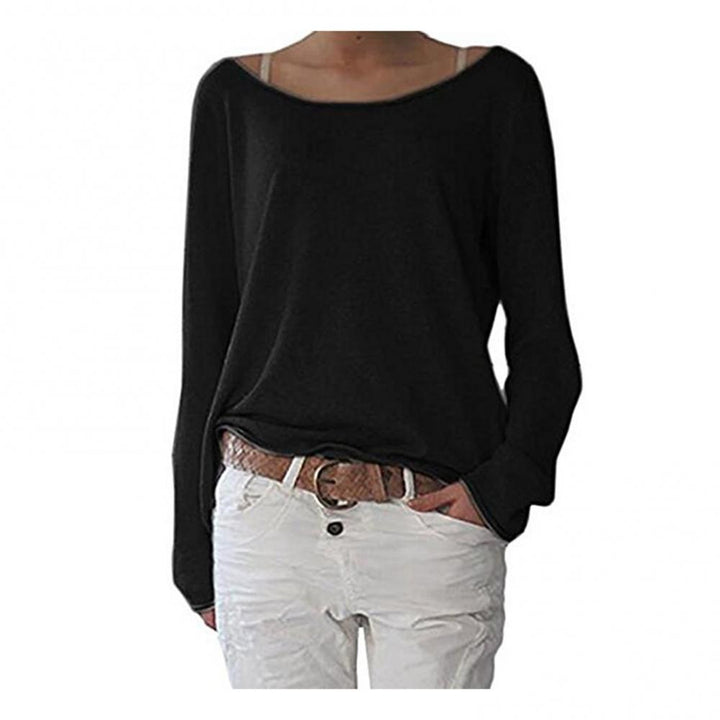 Top de mujer básico para estilo casual. Blusa relajada de moda femenina con escote amplio, muy versátil.