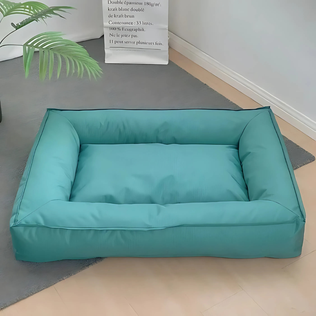 Cama gris ortopédica para perros, confort premium y apoyo para el bienestar animal en el hogar.