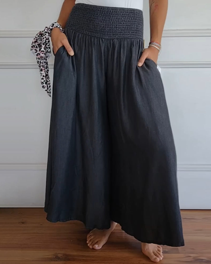 Pantalón recto gris de mujer, cintura elástica. Tejido fluido para máximo confort diario, estilo versátil.