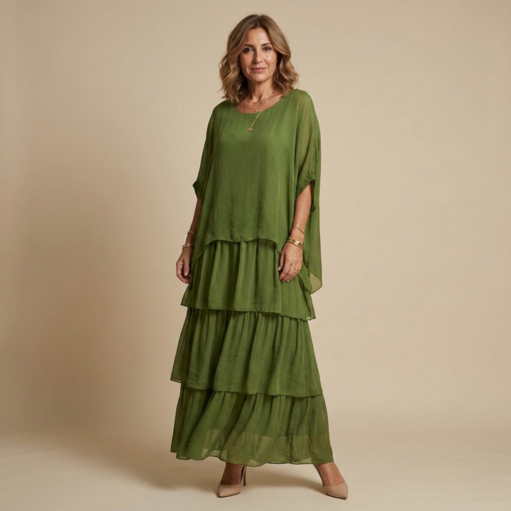 Vestido largo fluido para mujer, elegante en capas con manga suelta. Perfecto para moda femenina versátil.