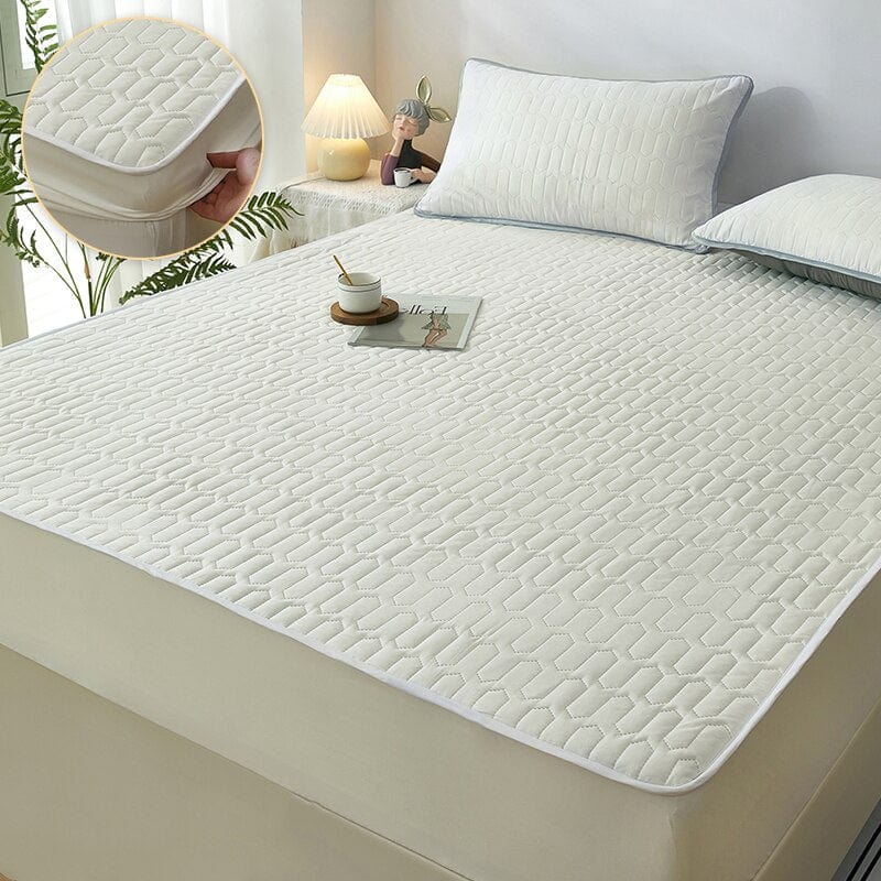 Protector de colchón impermeable y acolchado que promueve un descanso higiénico y suave en tu hogar.