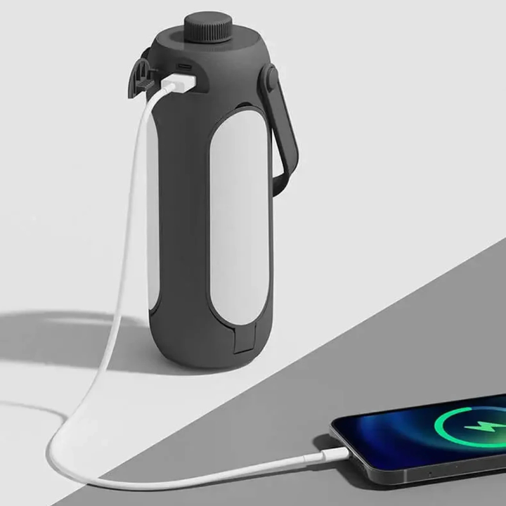 Aventura nocturna con lámpara LED portátil recargable, luz cálida y funcional para exteriores.