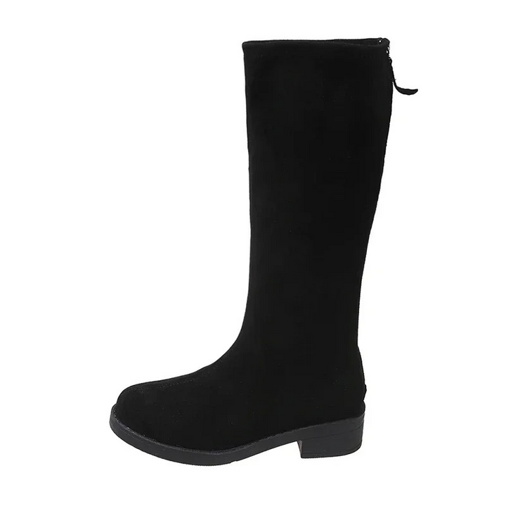 Calzado ligero: botas negras altas para mujer, versátiles y cómodas.