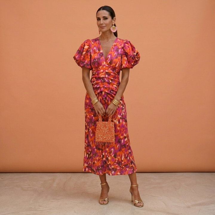 Vestido elegante de primavera para mujer con escote V y mangas abullonadas, ideal para moda casual.