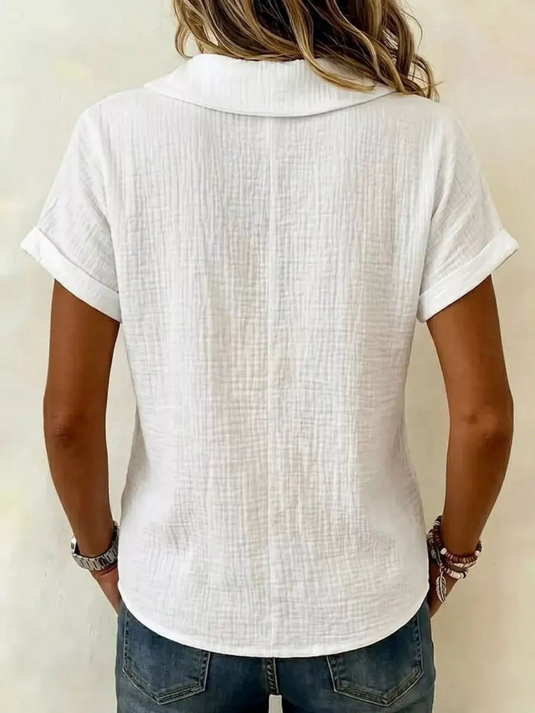 Blusa texturizada cómoda para mujer, manga corta, diseño versátil y elegante, perfecta para el día a día.