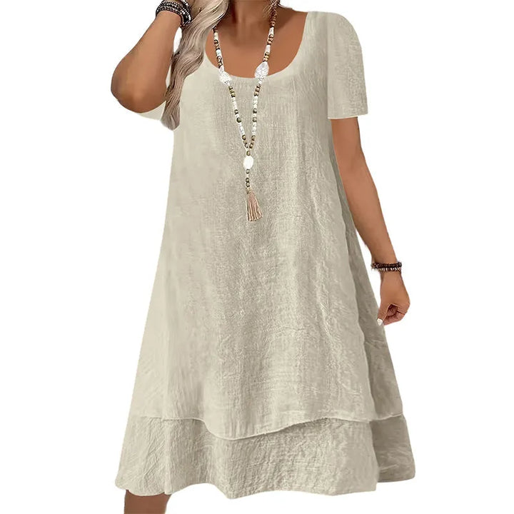 Vestido cómodo de mujer, corte amplio y holgado, manga corta y cuello redondo. Ideal para un estilo casual.