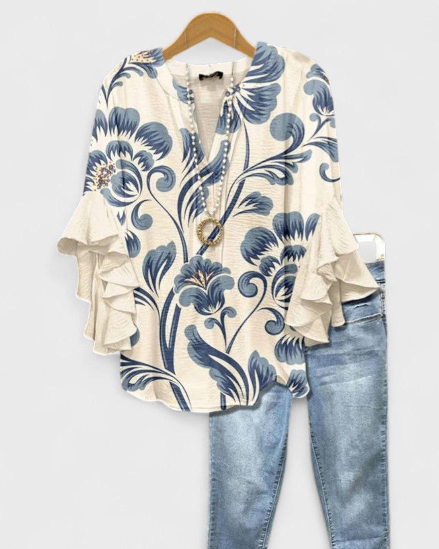 Blusa casual de mujer con diseño floral, cuello en V y volantes; perfecta para el verano.