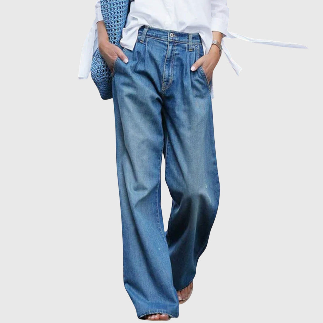 Vaqueros anchos de mujer de denim azul claro, tiro alto, estilo casual y cómodo para uso diario.