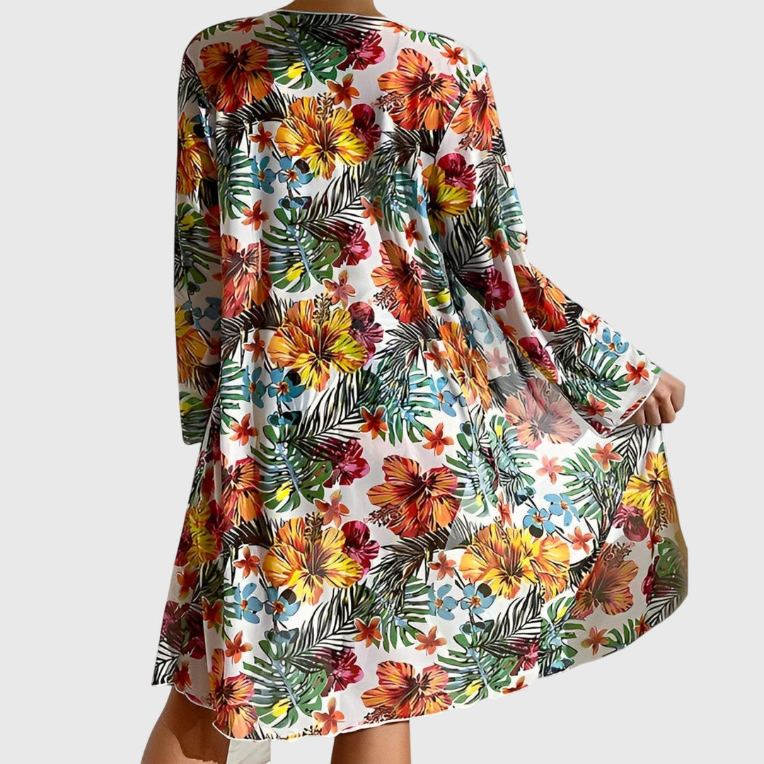 Bañador de moda para mujer: bikini 3 piezas tropical con kimono floral y top con lazo para el verano.
