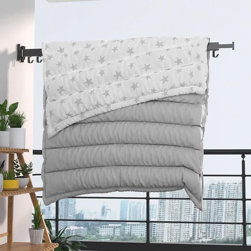 Tendedero moderno y plegable de pared para ropa, ideal para balcones y lavanderías. Solución eficiente.