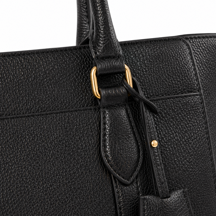 Bolso tote para mujer de piel negra, combina elegancia y amplio espacio para el uso diario.