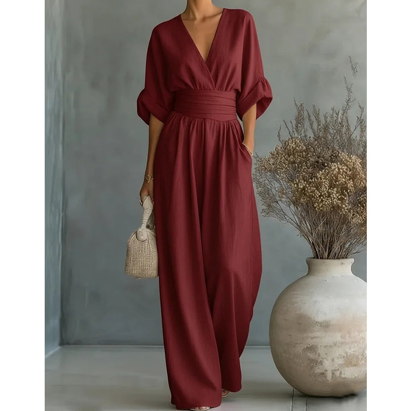Mono para ocasiones especiales, presenta un escote V y pantalón fluido de cintura alta para mujer.