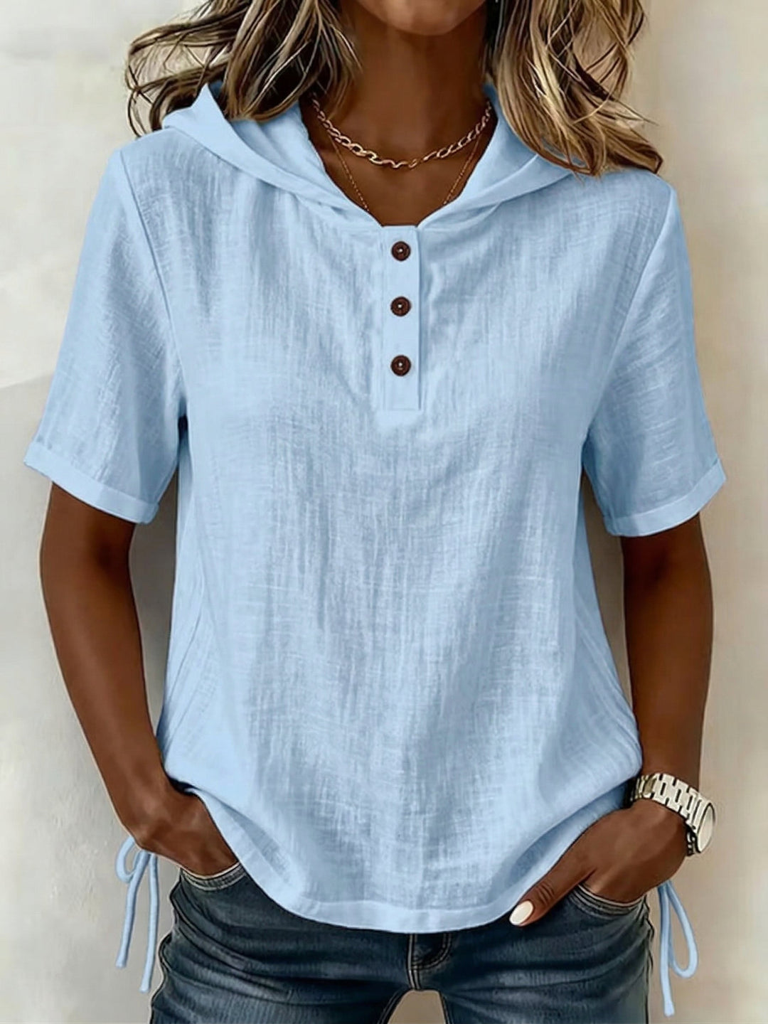 Blusa de mujer con botones y capucha, manga corta, un top casual y versátil para el día a día.
