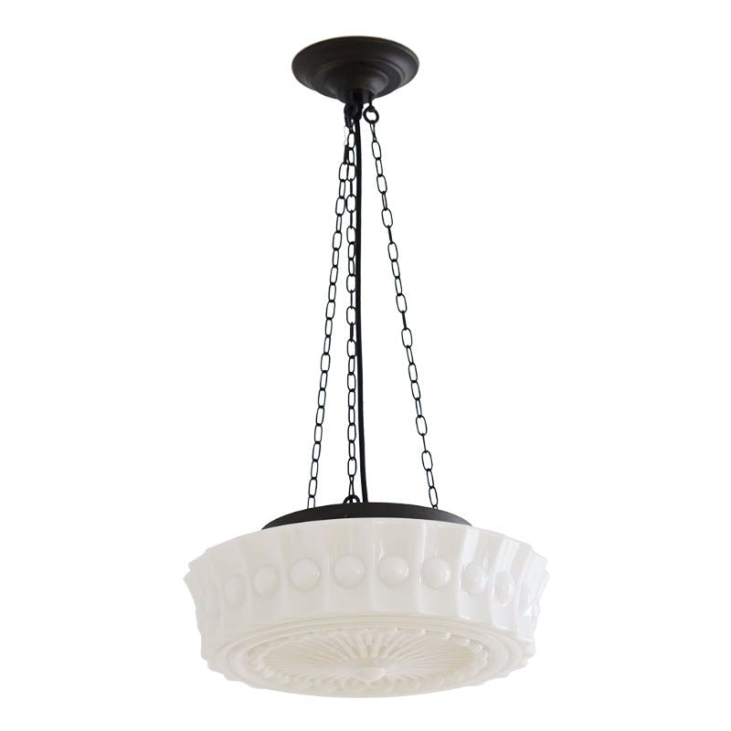 Iluminación decorativa: lámpara colgante cilíndrica de hierro y vidrio, fácil de instalar.