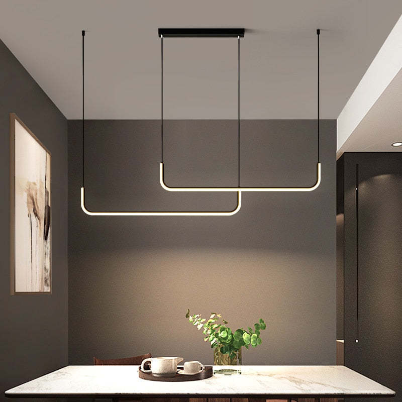 Lámpara colgante LED con luz cálida y regulable. Diseño moderno dorado y negro. Iluminación perfecta para el hogar.