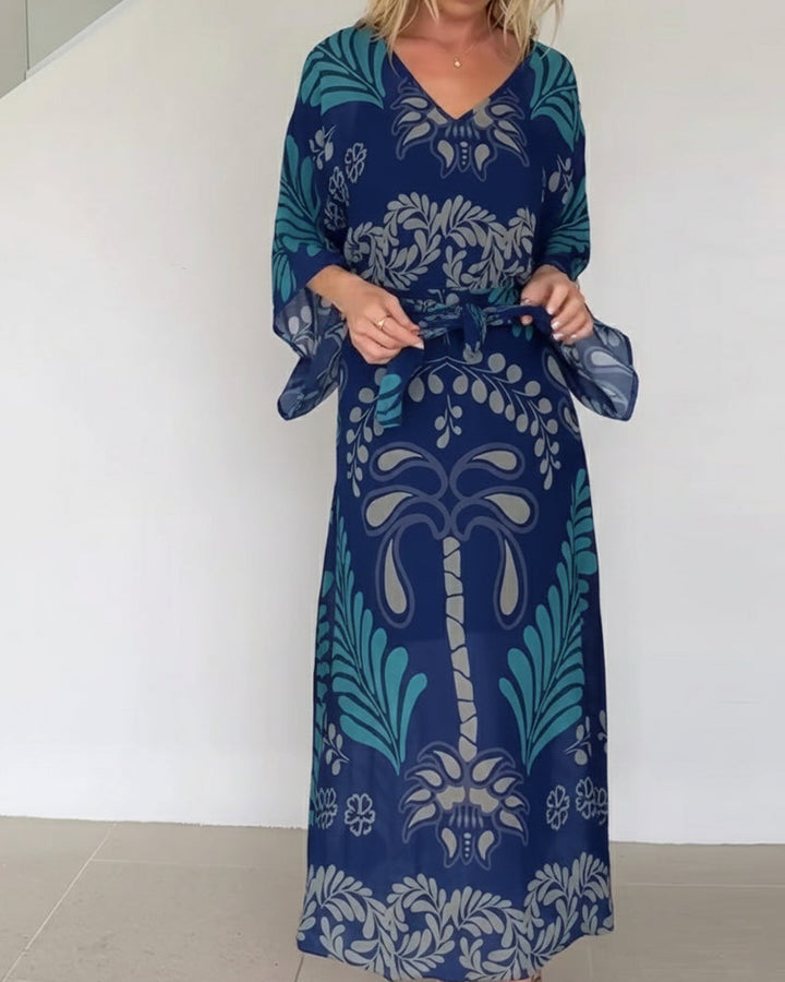 Vestido de mujer maxi fluido con estampado de hojas. Perfecto para un look casual chic y femenino.