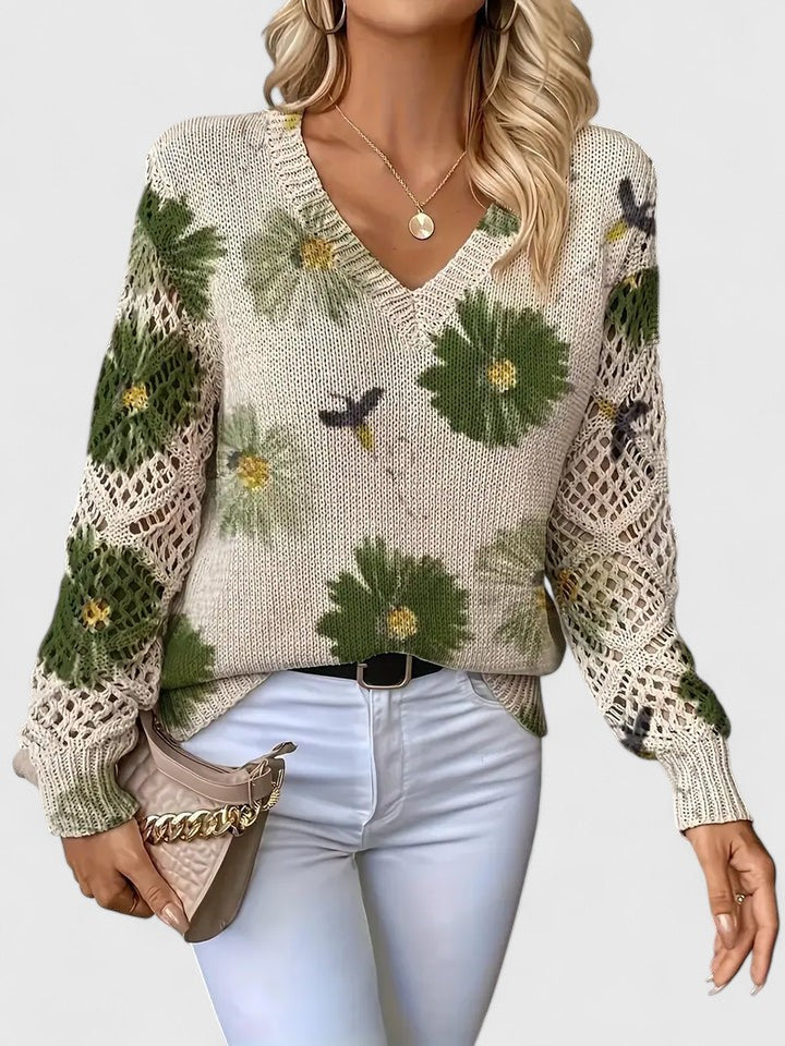 Jersey de punto floral para mujer. Diseño elegante y cálido, ideal para los días fríos de invierno.