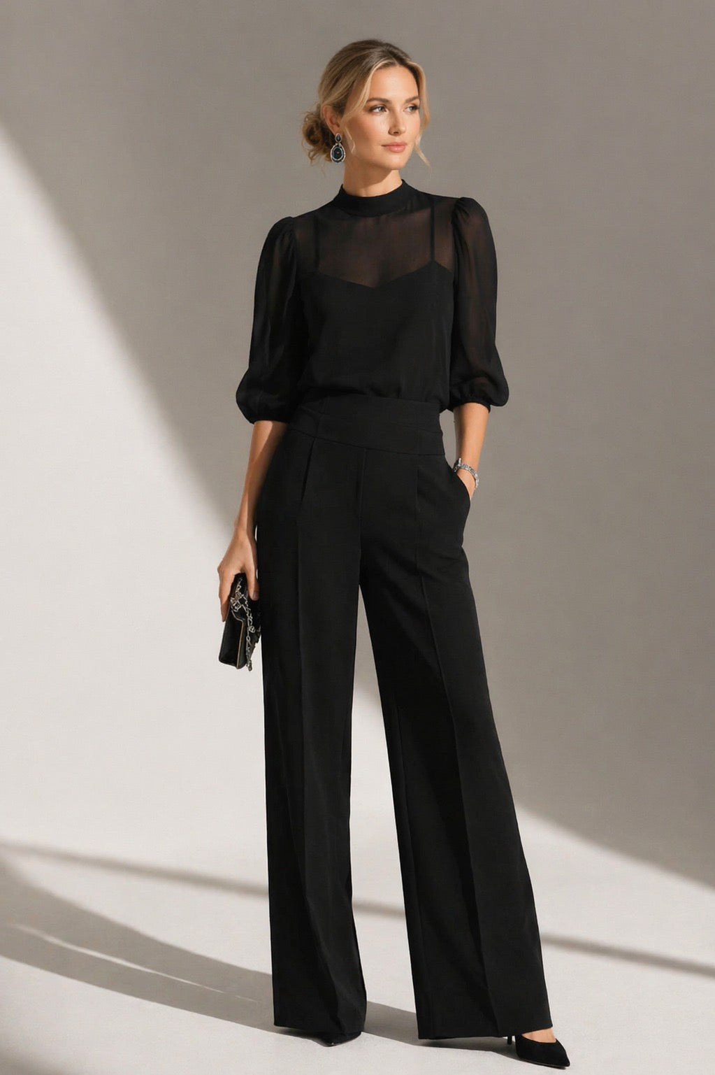 Moda femenina: mono negro largo de mujer. Jumpsuit cómodo y versátil sin mangas para estilo casual sofisticado.
