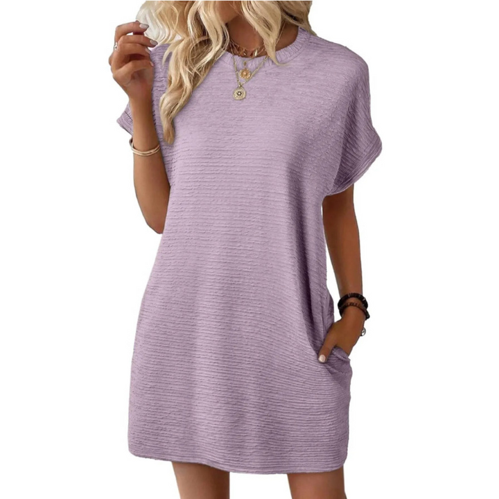 Vestido mini Sofía moderno y elegante para mujer, con bolsillos. Ideal para un look fluido y fresco de verano.