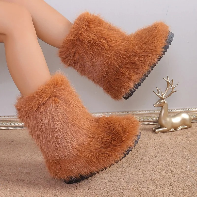Interior forrado de botas de invierno cálidas para mujer. Ofrece confort superior y protección efectiva contra el frío.