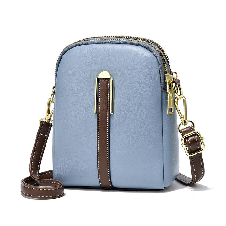 Accesorio casual: mini bolso bandolera FLORA, disponible en varios colores.