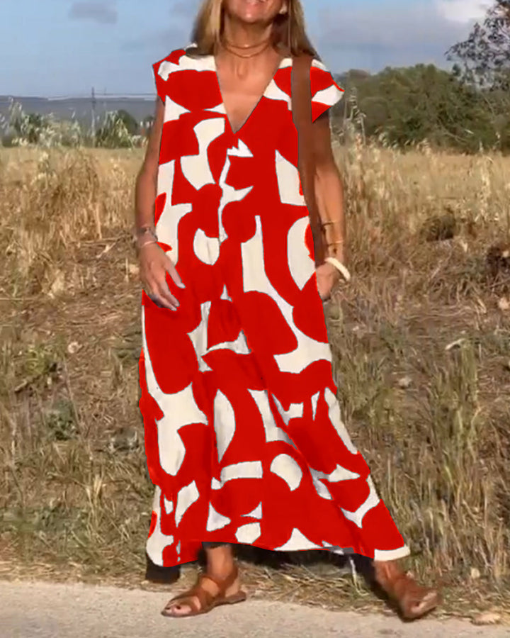 Vestido de mujer estampado, tejido fluido de poliéster, escote V. Look casual y chic.