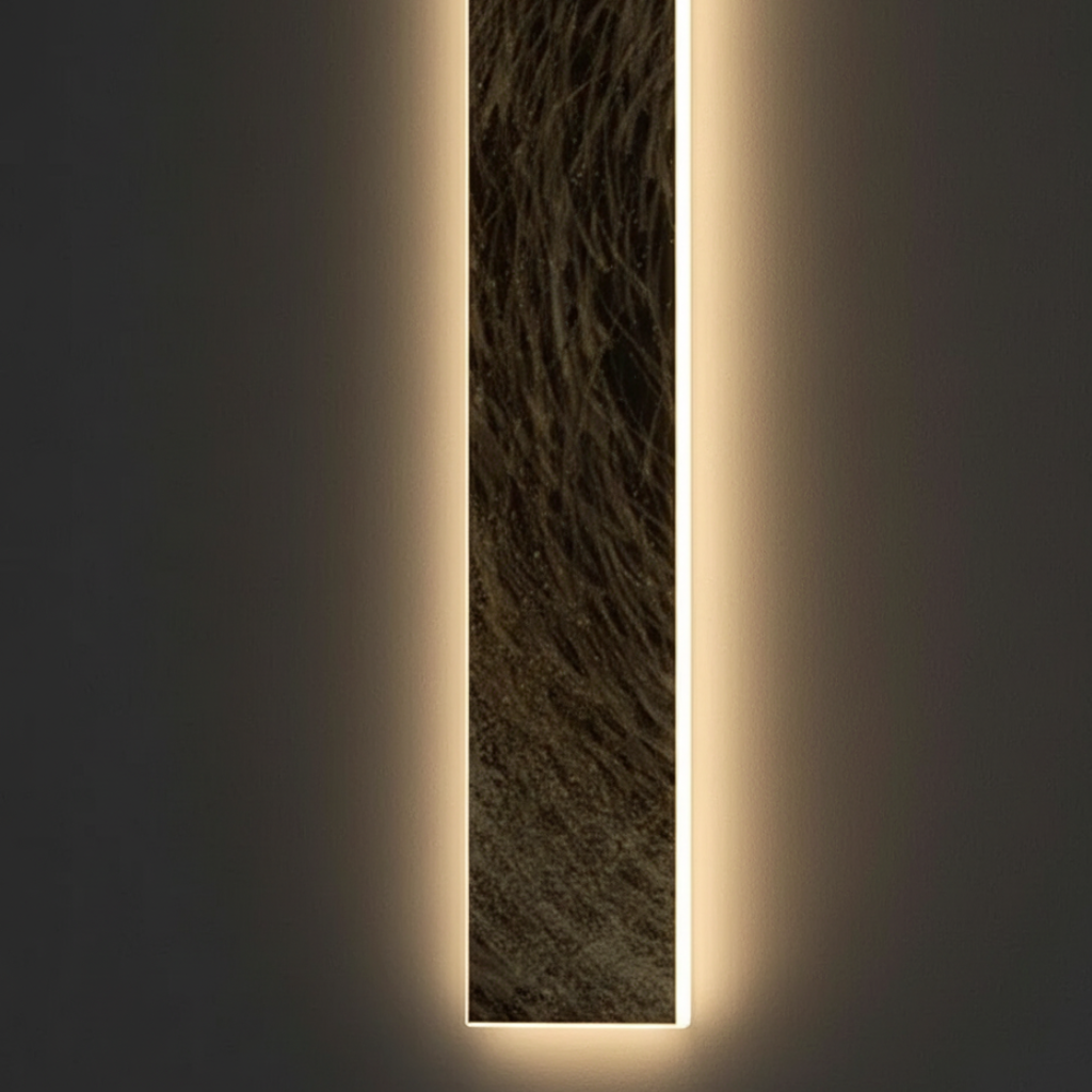 Aplique LED Lunare de lujo. Iluminación de pared moderna para crear un ambiente cálido y sofisticado.