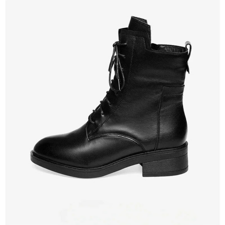 Botines femeninos negros con silueta de punta afilada, un calzado elegante y cómodo para el tobillo.