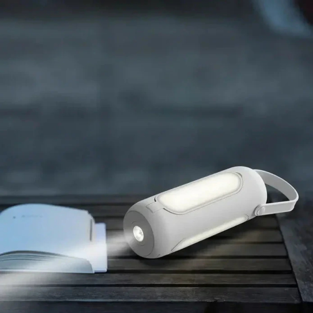 Lámpara portátil recargable con LED de luz cálida, perfecta para ambiente en exteriores y hogar.