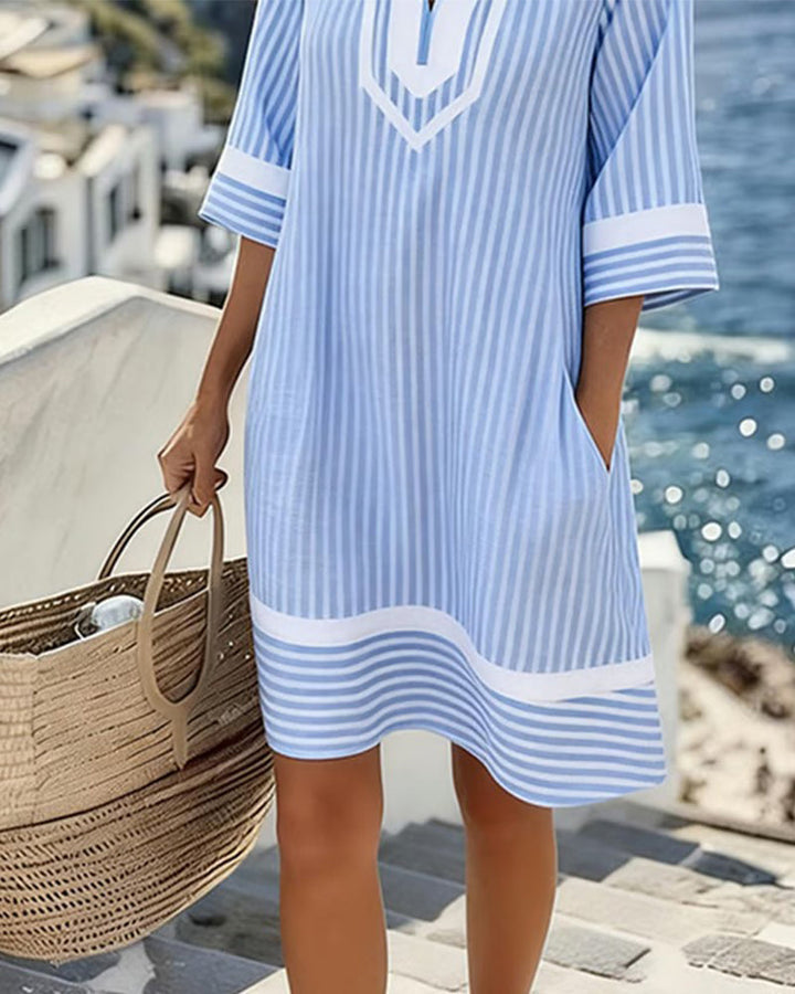 Vestido fresco de rayas para mujer, cuello V, perfecto para un look casual de verano.