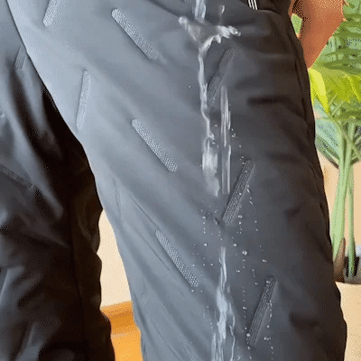 Pantalones impermeables térmicos unisex. Perfectos para senderismo y frío, ofrecen comodidad y protección respirable.
