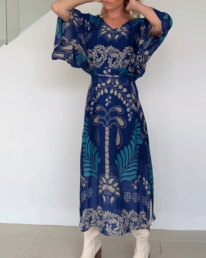 Vestido bohemio maxi de mujer con estampado de hojas. Fluido, elegante y muy cómodo para el verano.