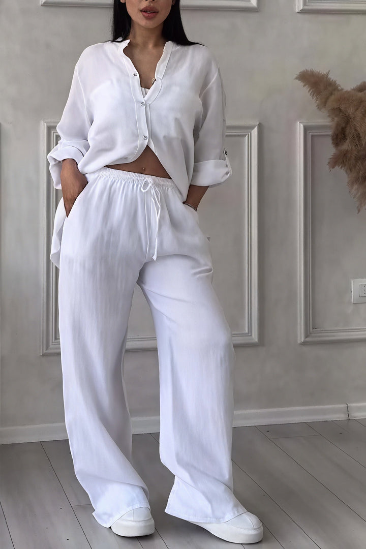 Moda casual 2024: Conjunto Ava de dos piezas para mujer con camisa de botones y pantalón de pierna ancha.