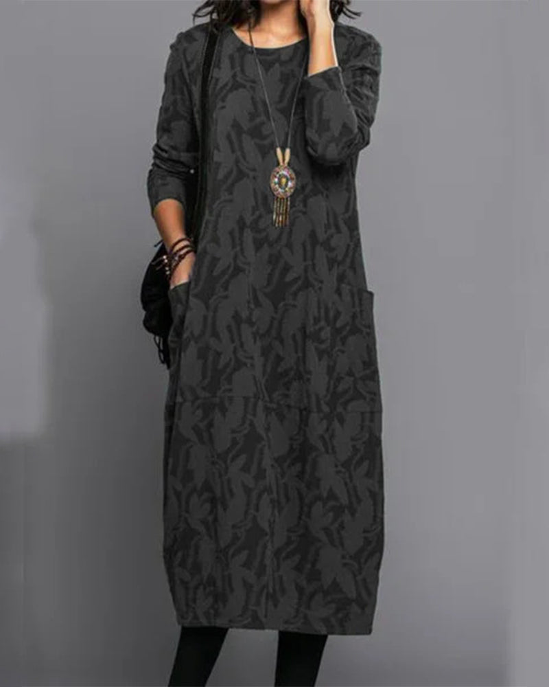 Vestido de mujer midi con manga larga. Silueta fluida y versátil, aporta elegancia casual para cualquier ocasión.