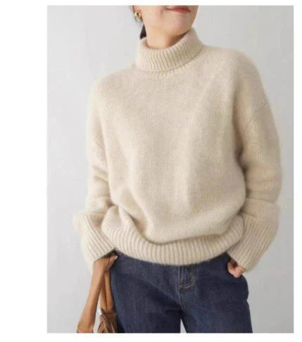 Jersey de cachemir femenino, cuello alto, para un look casual pero sofisticado y premium.