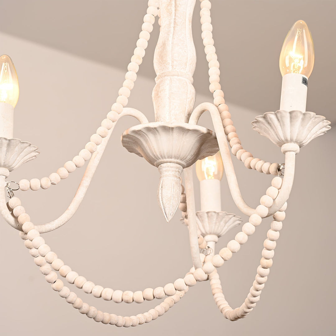 Candelabro colgante moderno de tres brazos curvos, acabado mate blanco antiguo. Elegancia en tu hogar.