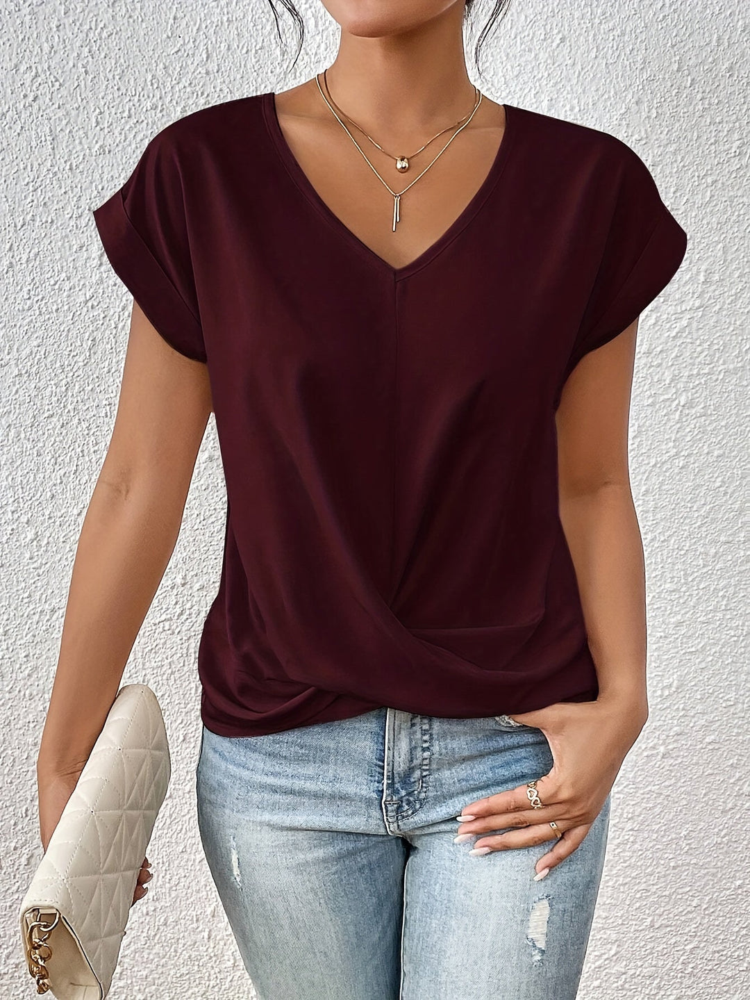 Blusa elegante y moderna para mujer. Diseño cruzado con escote V, drapeado, ideal para oficina o looks casuales chic.