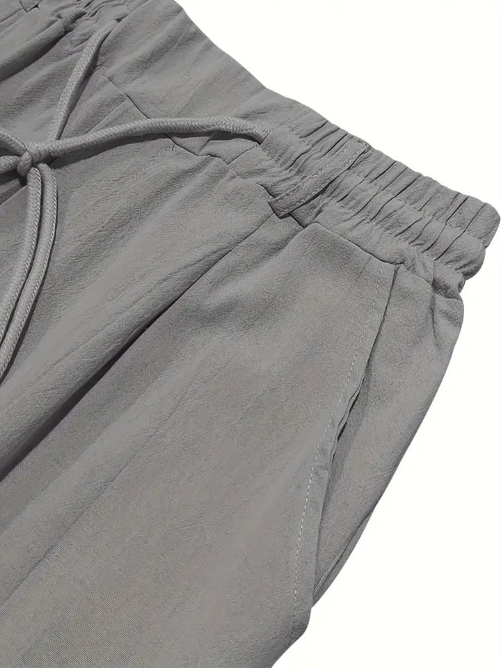 Pantalones de lino para hombre, diseño relajado, con cordón, ideales para la temporada de calor.