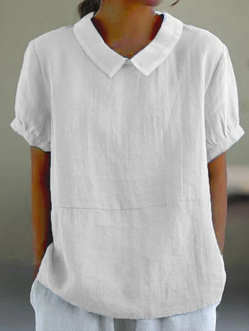 Blusa fluida de cuello alto para mujer, un básico versátil que combina elegancia y comodidad en verano.