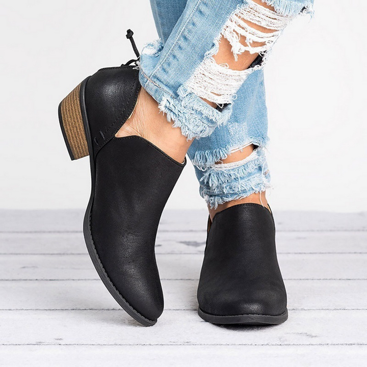 Botines de tacón bajo en rosa para mujer, un toque chic y moderno para la moda femenina con gran comodidad.