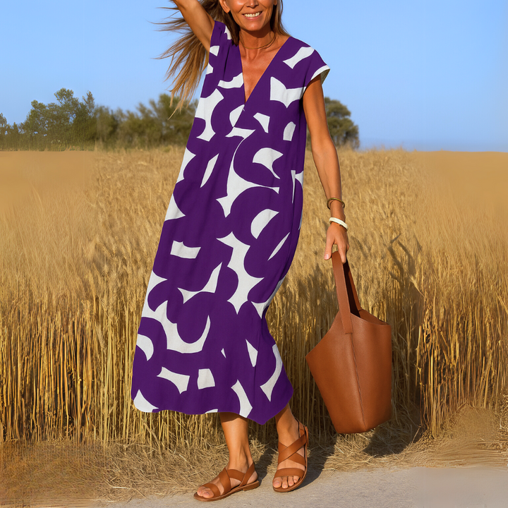 Vestido de mujer fluido y cómodo con escote en V. Versátil para verano, moda casual o para eventos de fiesta.